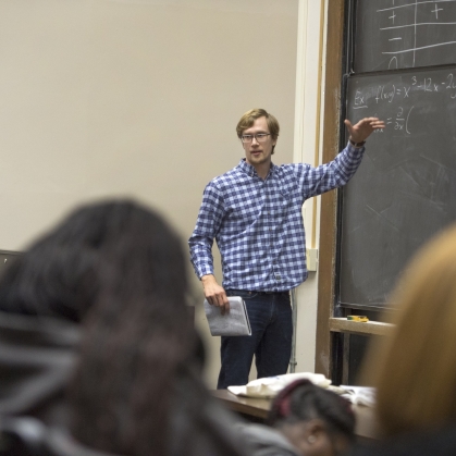 Mathematics postdoc Jacek Cyranka teaches fluid dynamics in Calculus II class.