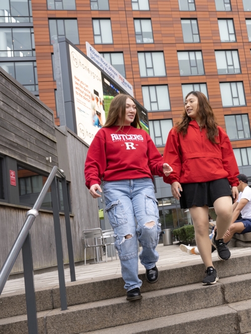 Students walk in The Yard on College Avenue campus